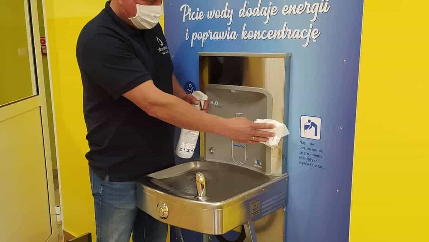Spa service performing sanitisation of drinking water dispenser